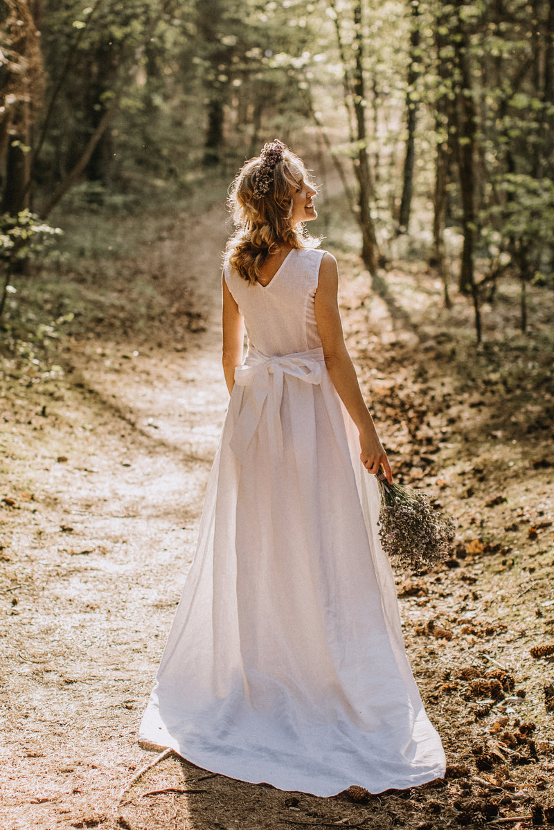 Linen wedding dress with a train